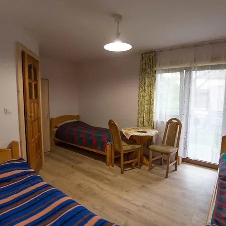Pod Jasieniami -basen Plac Zabaw Białka Tatrzańska