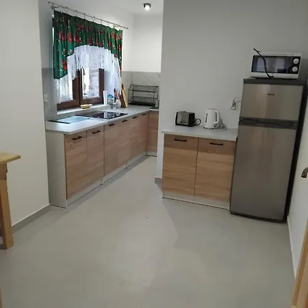 Pod Jasieniami -basen Plac Zabaw Białka Tatrzańska